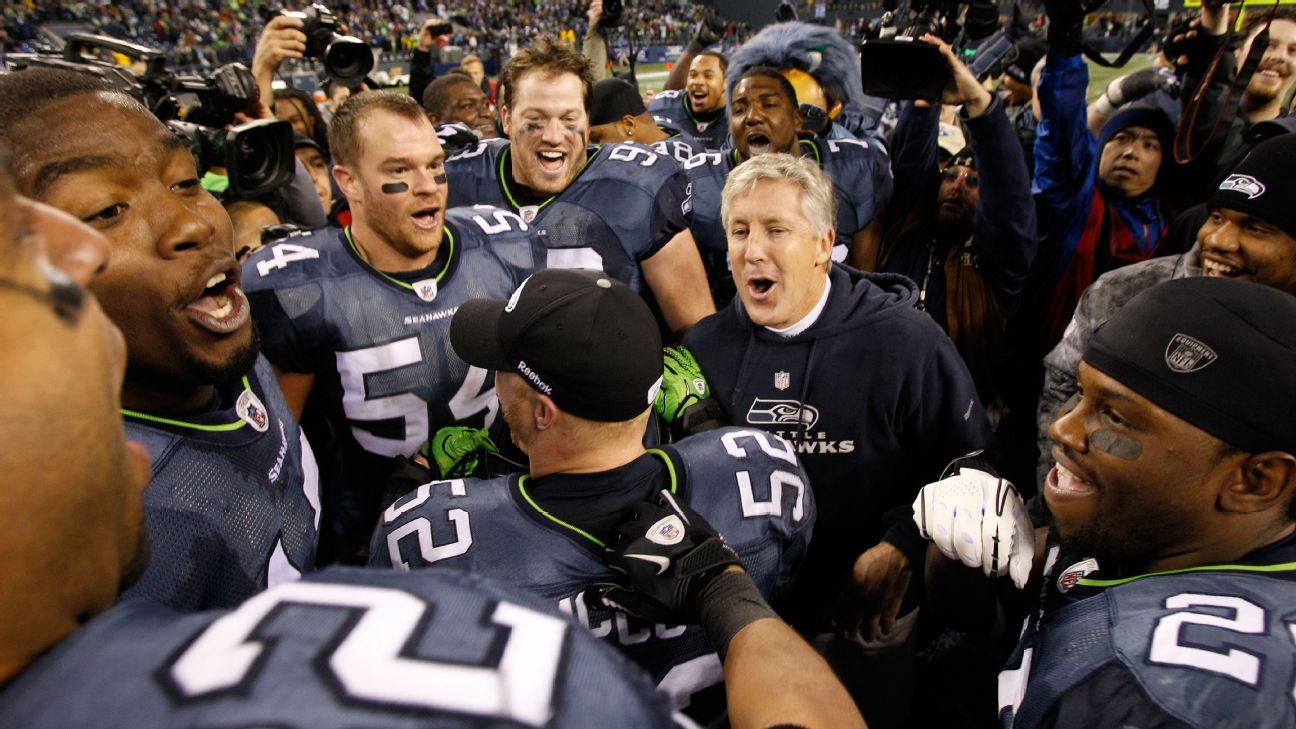 Seattle Seahawks fans celebrate a go score against the Dallas