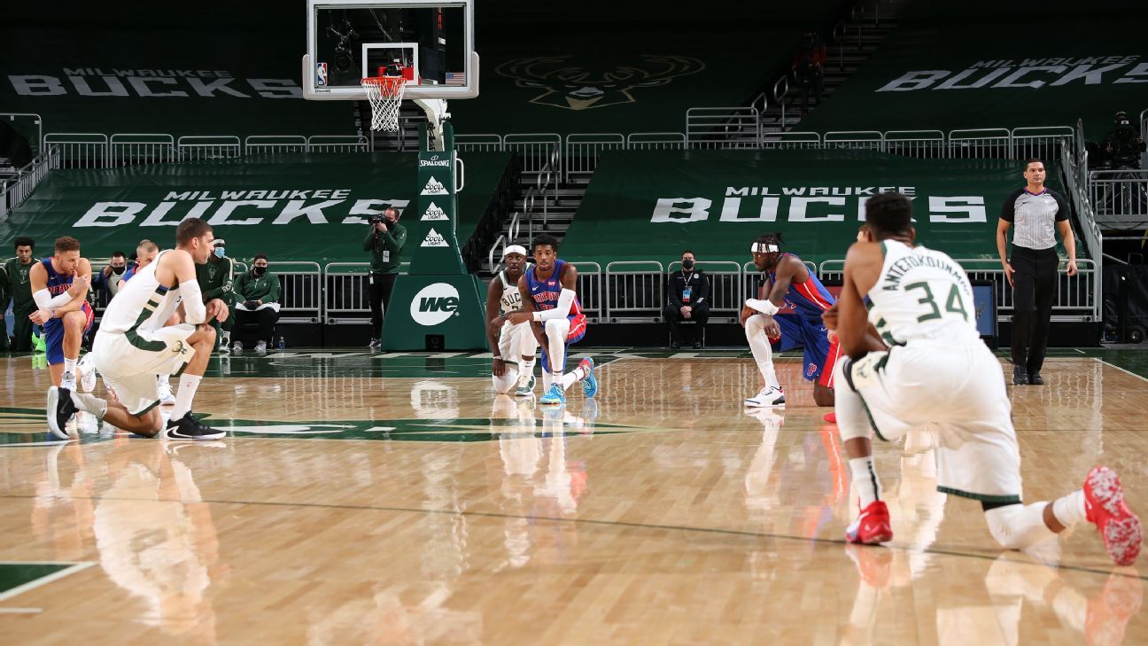 The Milwaukee Bucks and Detroit Pistons get on their knees in the first possessions of the game