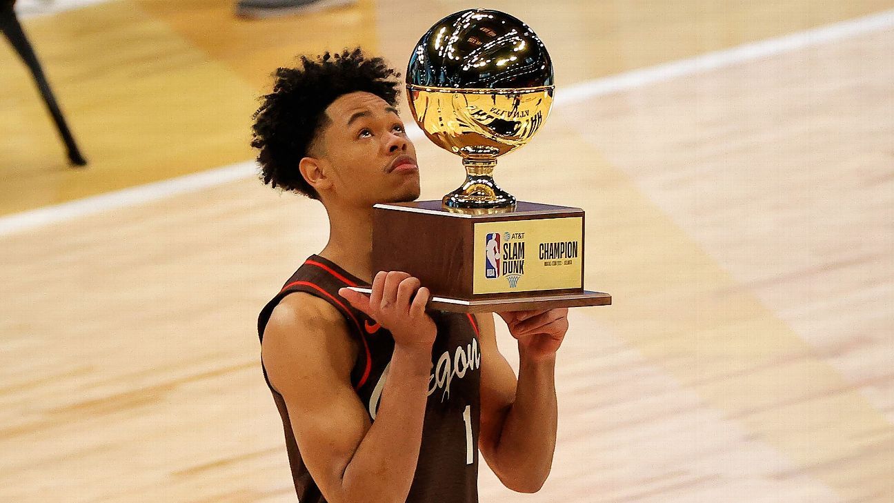 Portland Trail Blazers’ Anfernee Simons kisses on the brink of the NBA dunk contest