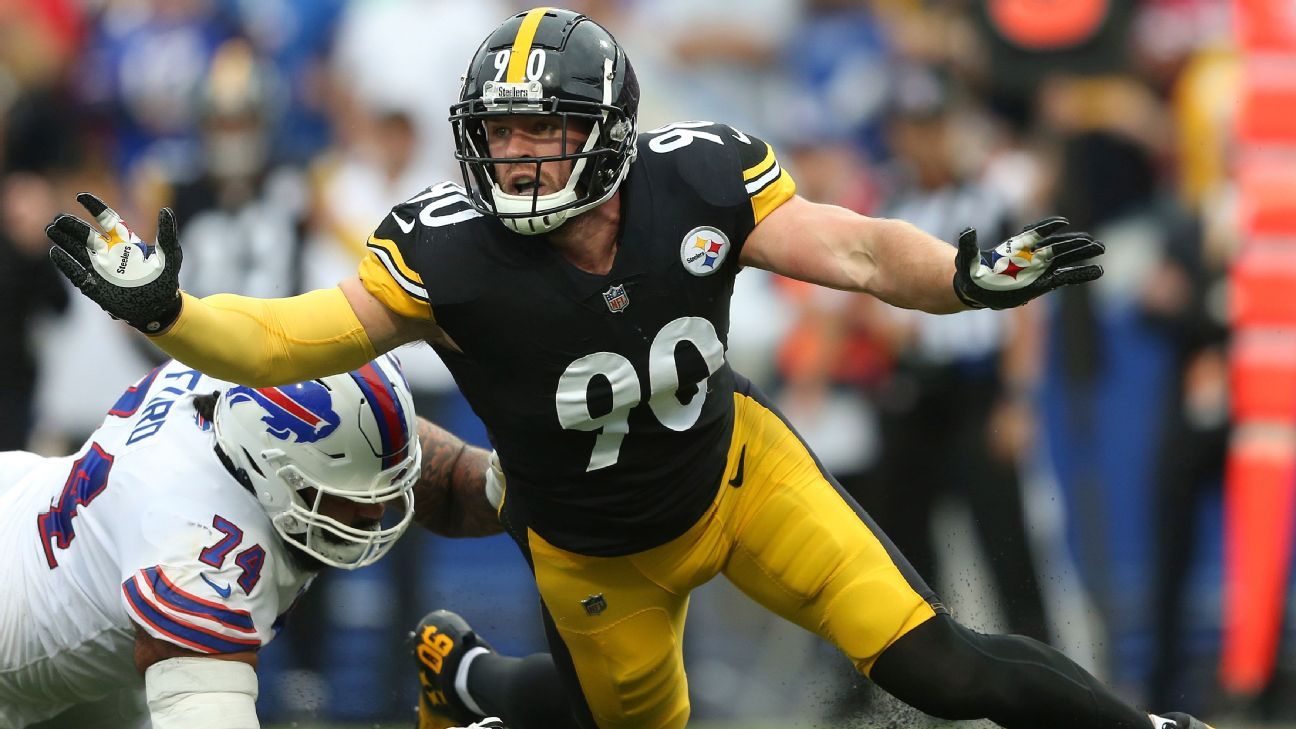 Anthony Brown of the Baltimore Ravens is sacked by T.J. Watt of