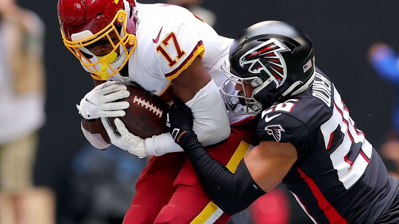 ATLANTA, GA – OCTOBER 30: Atlanta cornerback Isaiah Oliver (26) reacts  after a defensive touchdown during the NFL game between the Carolina  Panthers and the Atlanta Falcons on October 30th, 2022 at