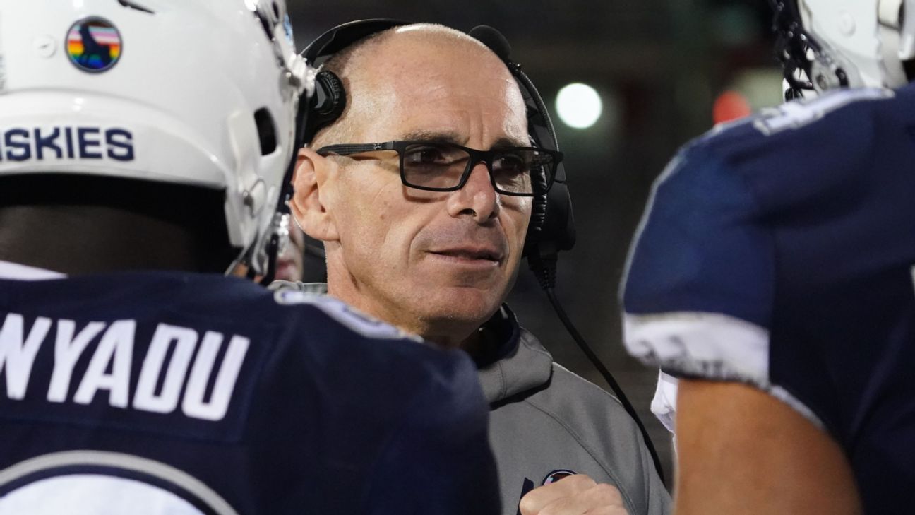 UConn coach Jim Mora retains former interim Lou Spanos to serve as