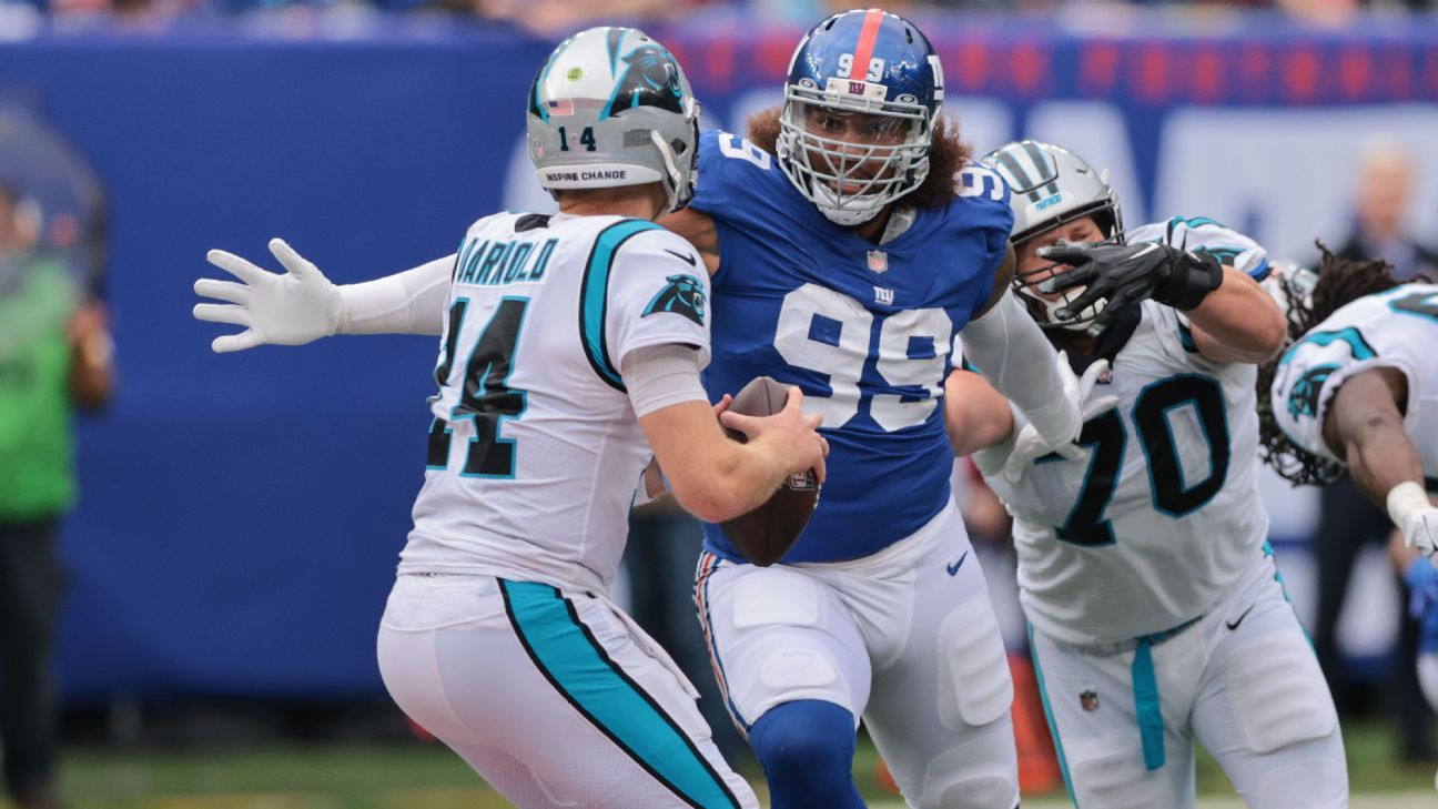 Carolina Panthers offensive tackle Brady Christensen (70) runs