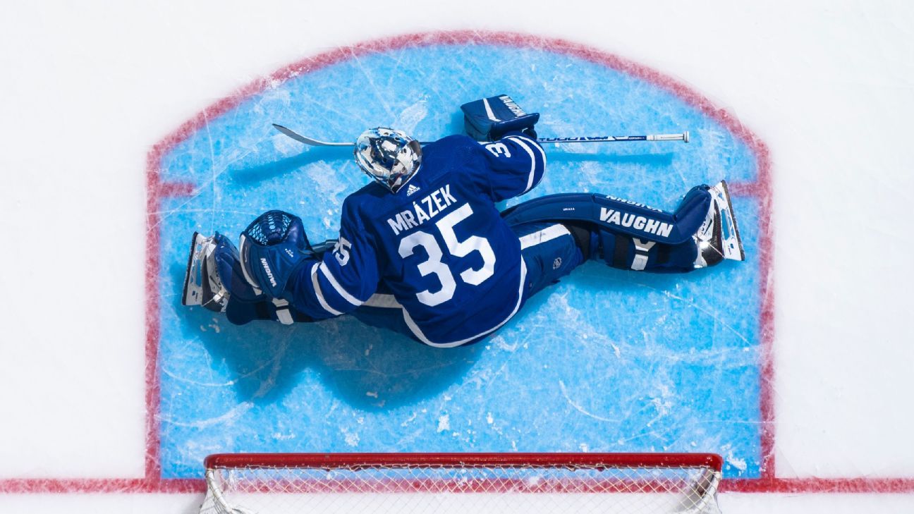 Toronto Maple Leafs sport green St. Pats jerseys against Blackhawks