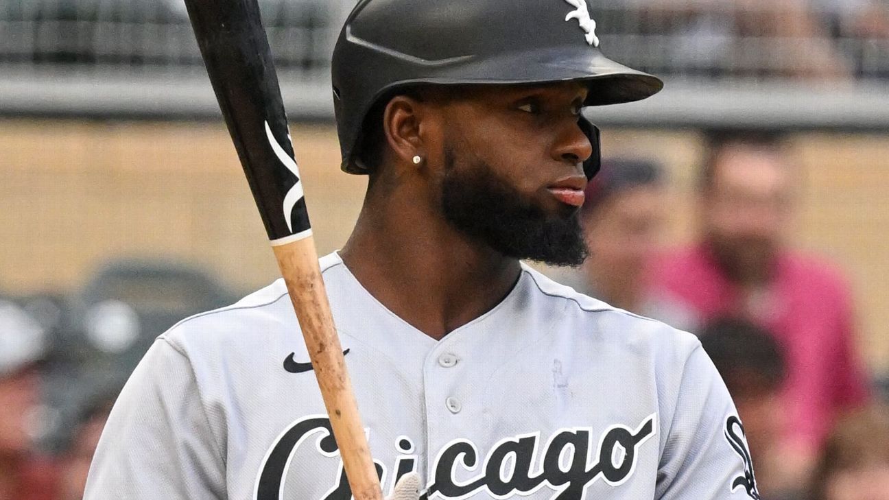 CHICAGO, IL - JUNE 09: Chicago White Sox center fielder Luis Robert Jr.  (88) and Chicago White Sox right fielder Gavin Sheets (32) chat while  running back to the dugout during a