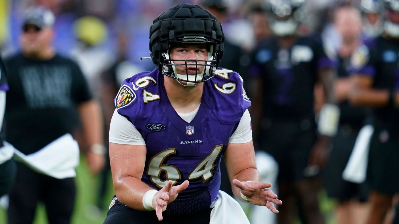 Baltimore Ravens center Tyler Linderbaum (64) looks on before a preseason  NFL football game against the Washington Commanders, Saturday, Aug. 27,  2022, in Baltimore. (AP Photo/Nick Wass Stock Photo - Alamy