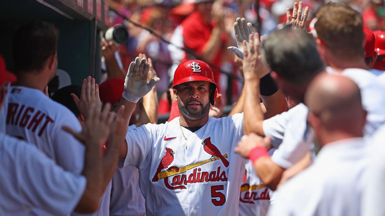 Pujols hits grand slam, leads Wainwright, Cards over Rockies