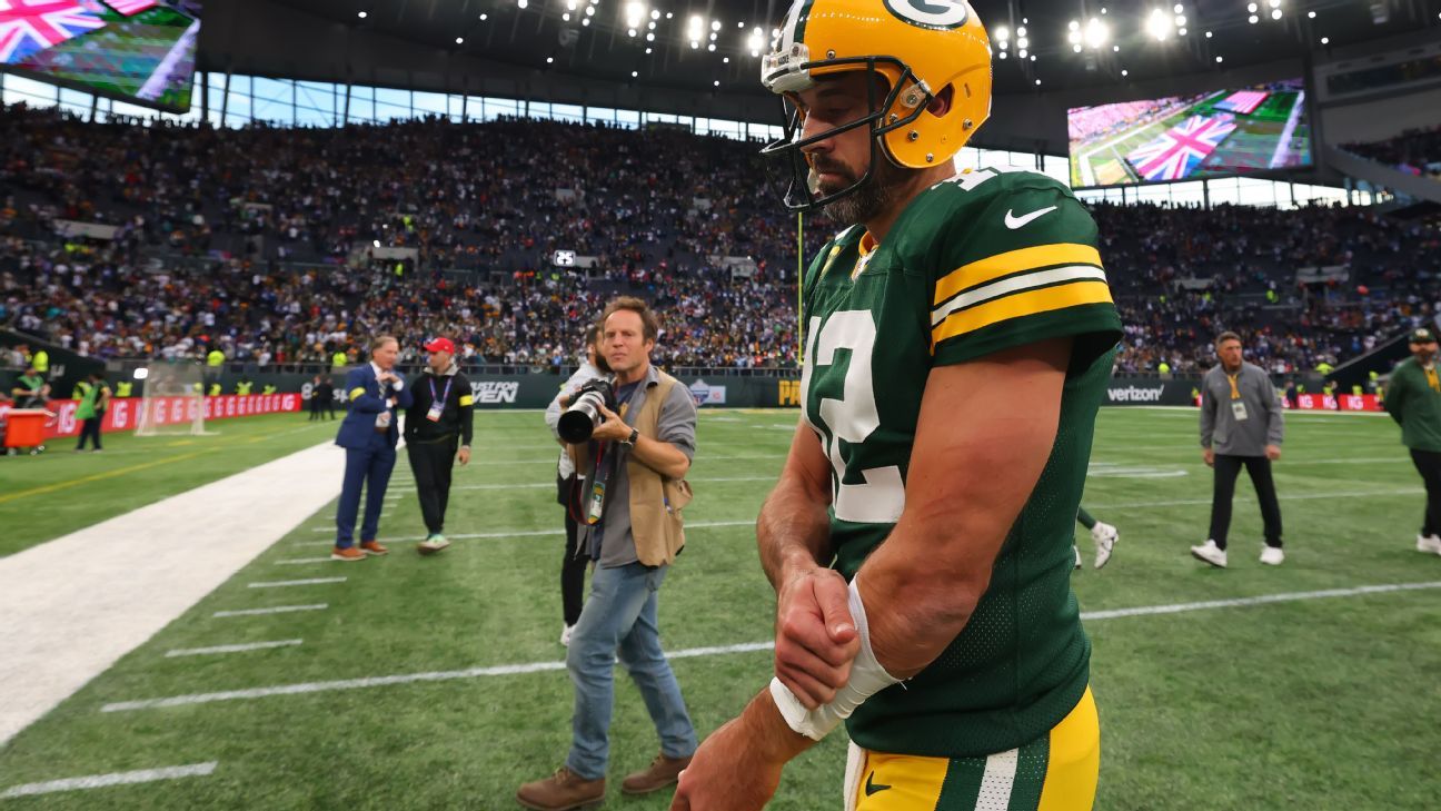 Aaron Rodgers of the Green Bay Packers is sacked by Oshane Ximines