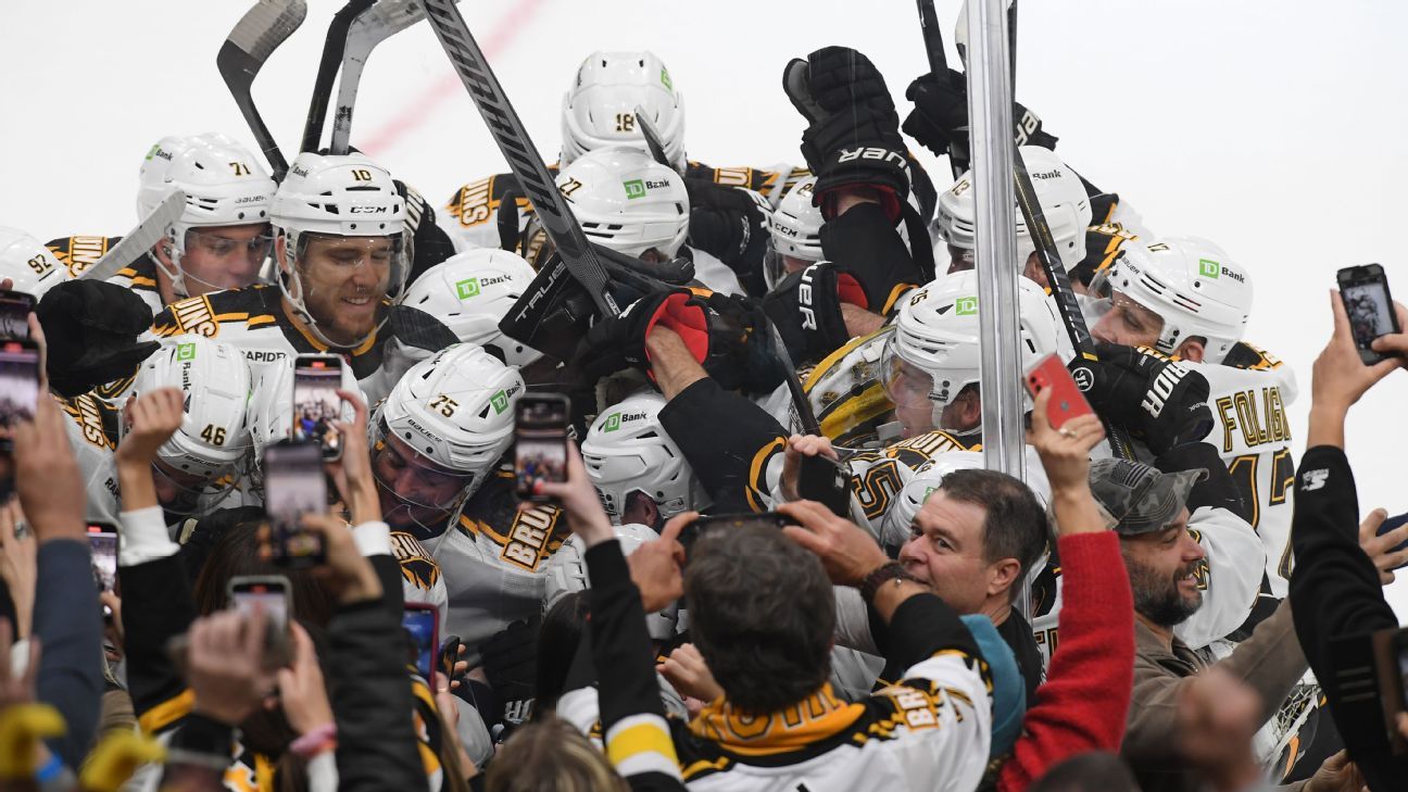 Bruins net NHL-record 12th straight home win to open season