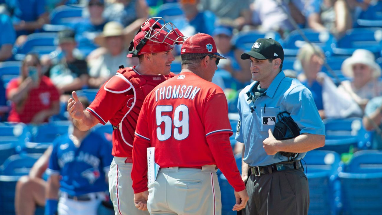 Ump ejects Phillies' J.T. Realmuto after awkward ball handoff - ESPN