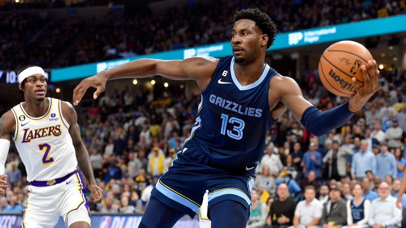 Memphis Grizzlies guard Ja Morant, right, and forward Jaren Jackson Jr. warm  up before an NBA basketball game against the Oklahoma City Thunder  Wednesday, Dec. 7, 2022, in Memphis, Tenn. (AP Photo/Brandon