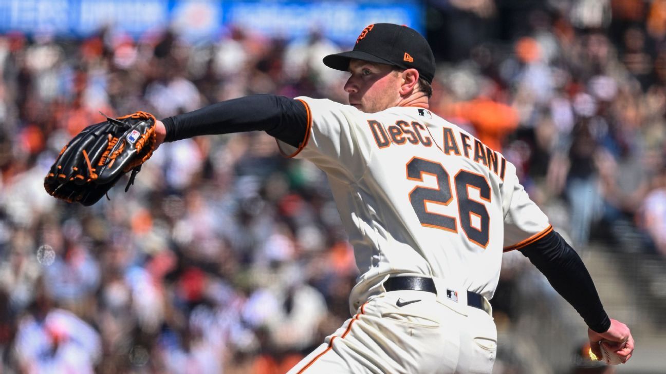 Anthony DeSclafani of the San Francisco Giants is taken out of the