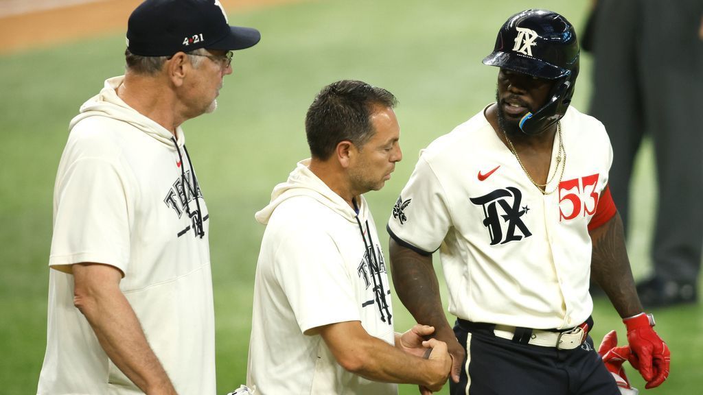 Rangers slugger Adolis García, leading the AL in RBIs, exits game after  getting hit by a pitch - The San Diego Union-Tribune