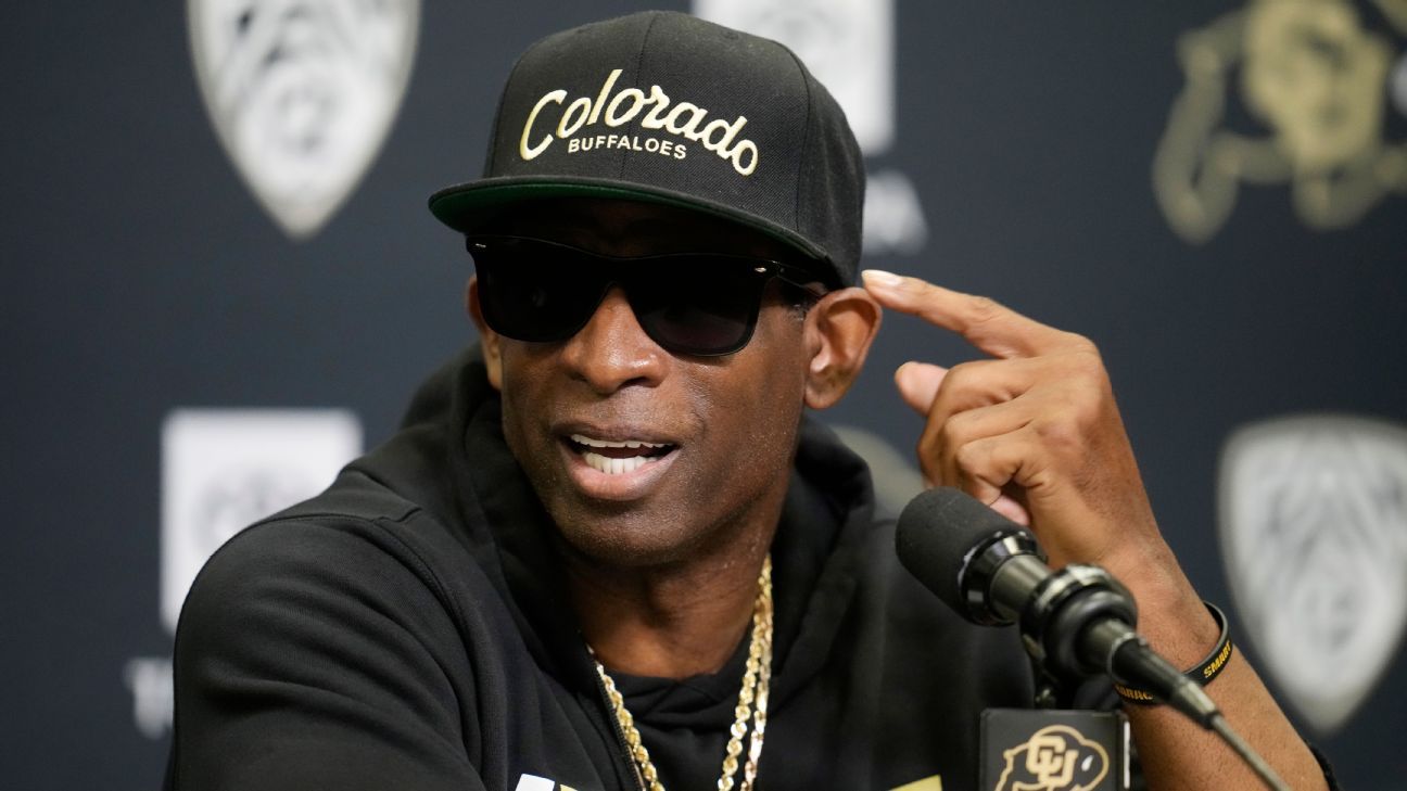 Colorado's Deion Sanders hands sunglasses to commentators, team - ESPN