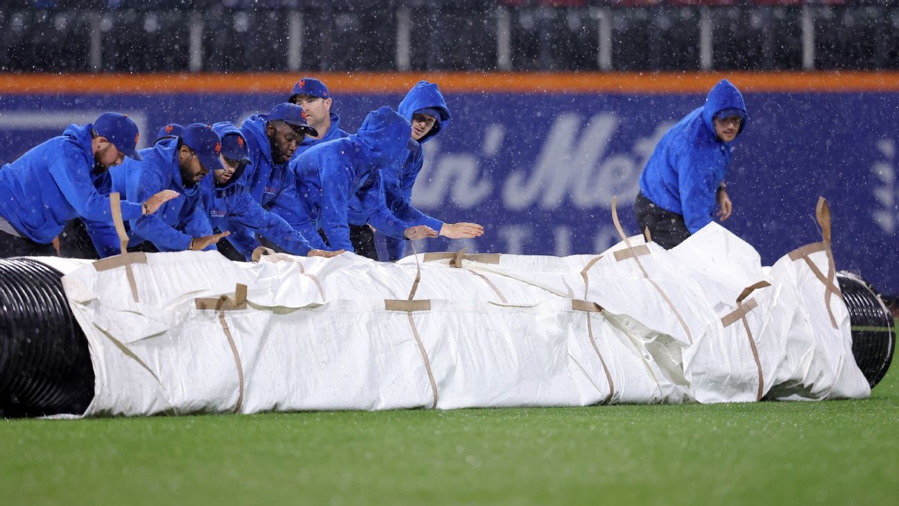 O Marlins Mets foi suspenso após um longo atraso.  Segunda-feira termina em jogo