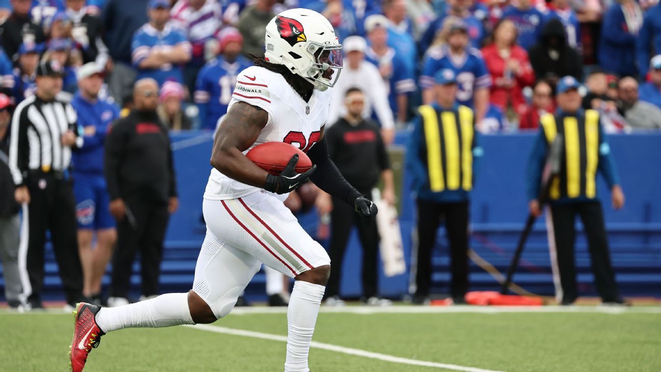 Cardinals player DeeJay Dallas is the first to score a touchdown in the new format