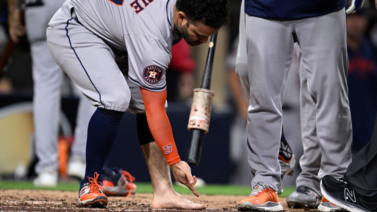 Jose Altuve is ejected for taking off his cleats and socks during the Astros’ wild win