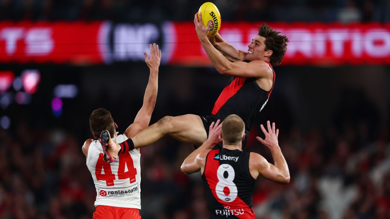 Essendon hold off fast-finishing Swans challenge