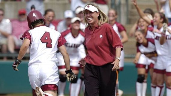 Patty Gasso: Oklahoma Softball GOAT Story Patty Gasso talking to her team during a game.