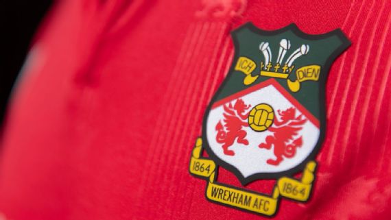 Wrexham Translator Honoured | Ryan Reynolds Wrexham team celebrating their promotion to the Championship