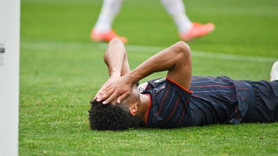 Turkey Loss: Poch & USMNT Face Uncertainty Malik Tillman with his head in his hands during the USMNT's 2-1 loss to Turkey