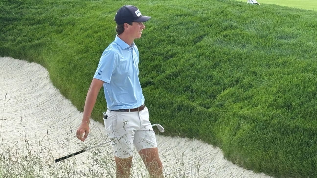 Mason Howell plays out of a bunker during a practice round at Oakmont.
