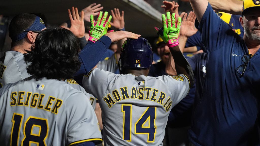 Brewers rally again to win record 14th straight
