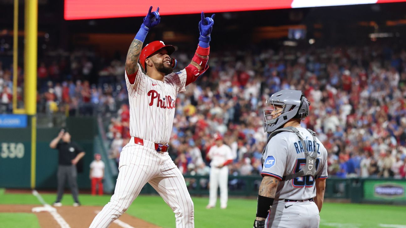 Phils seal 1st-round bye behind team-record 8 HRs