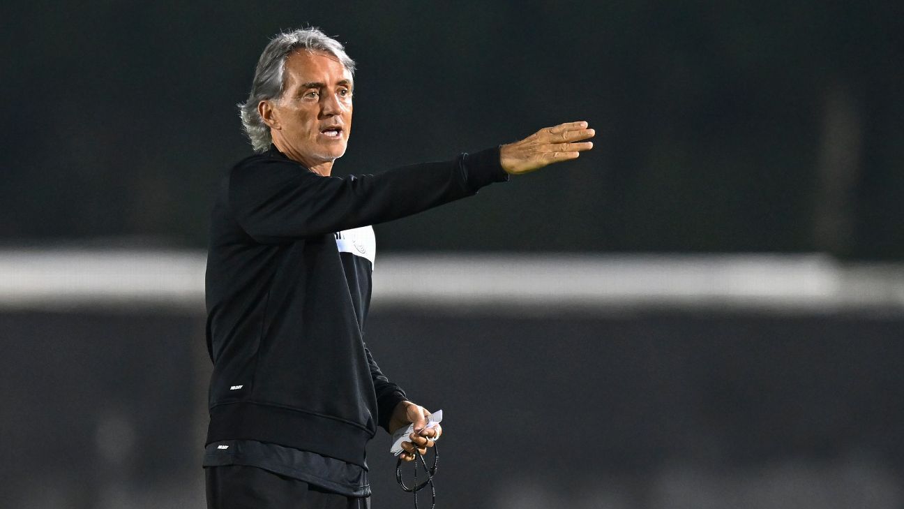 Mancini to miss game in Qatar due to travel issues