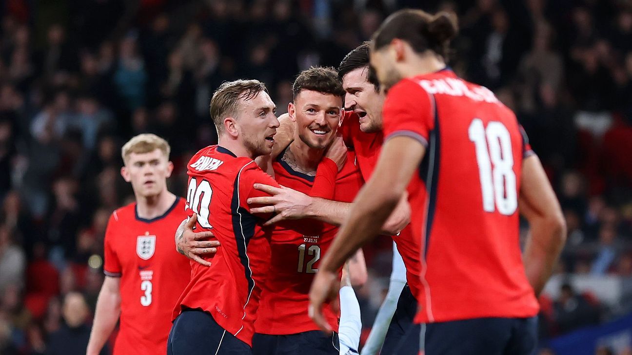 Uruguay players celebrate their late equalizing goal