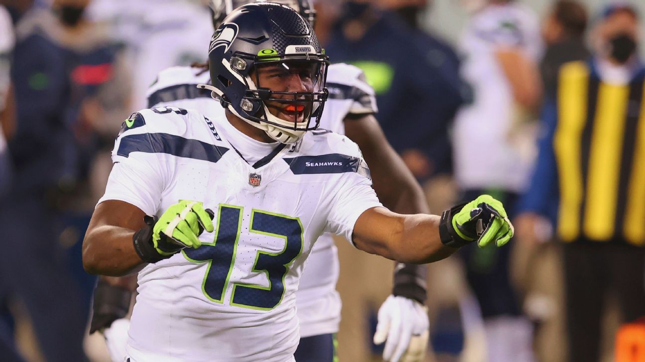 Carlos Dunlap says Russell Wilson told him he is here to stay with Seattle Seahawks