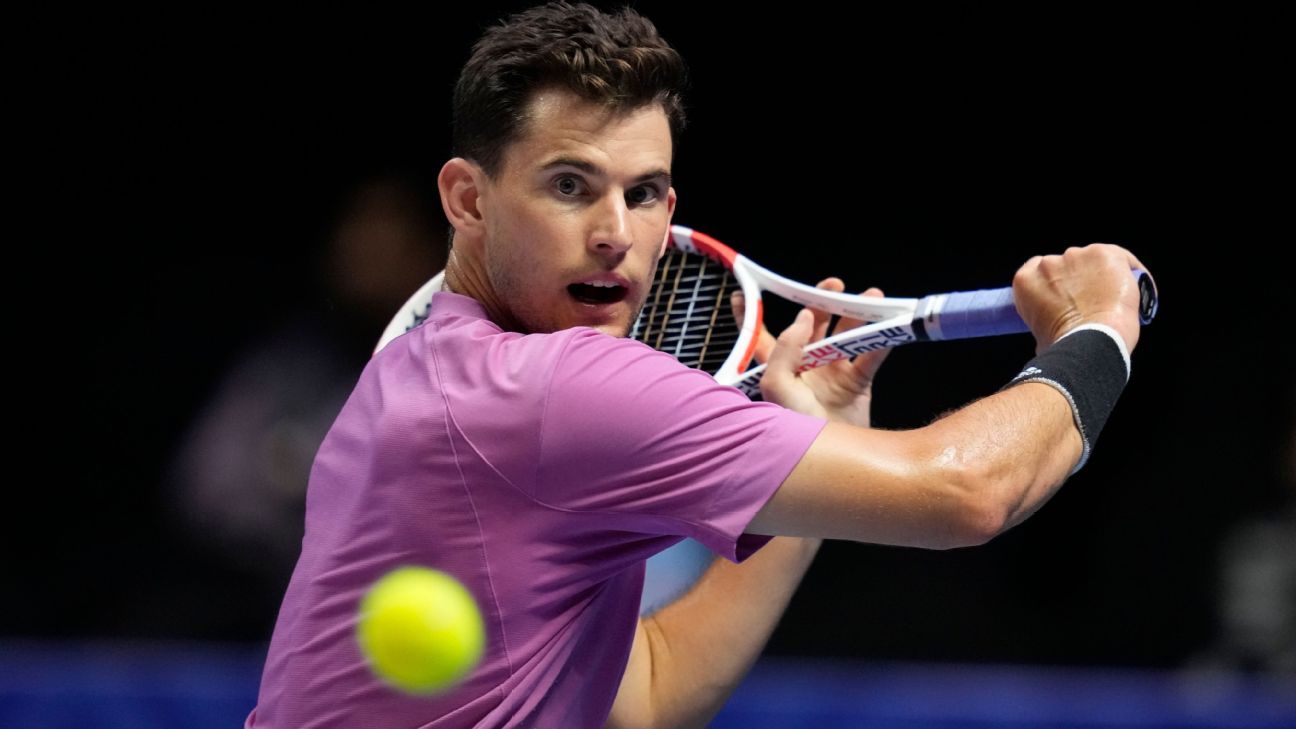 Thiem advances after brush with deadly snake